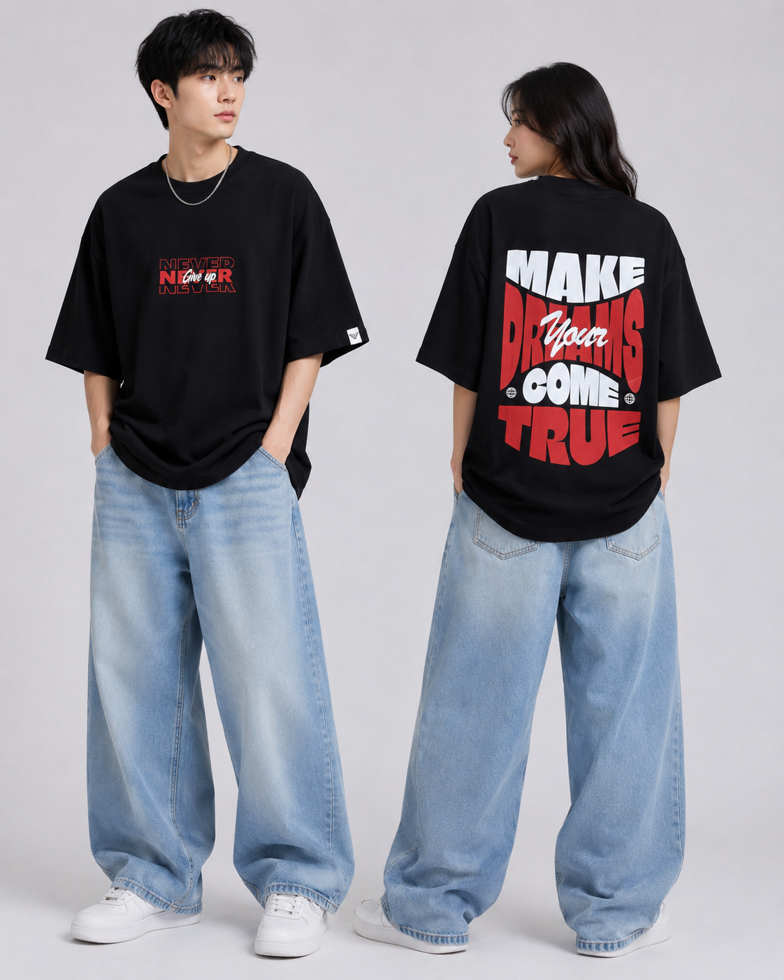 Two people wearing black t-shirts with text, one facing forward and the other facing backward, on a plain background.